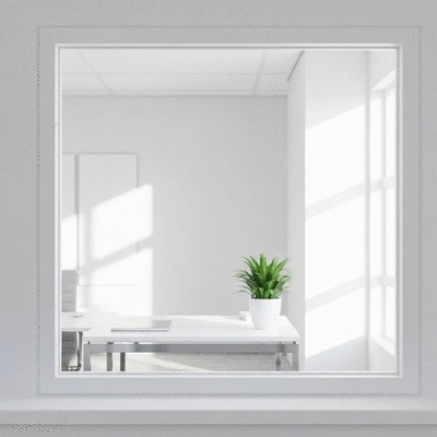 Vue d'un bureau moderne et propre à travers une vitre impeccable